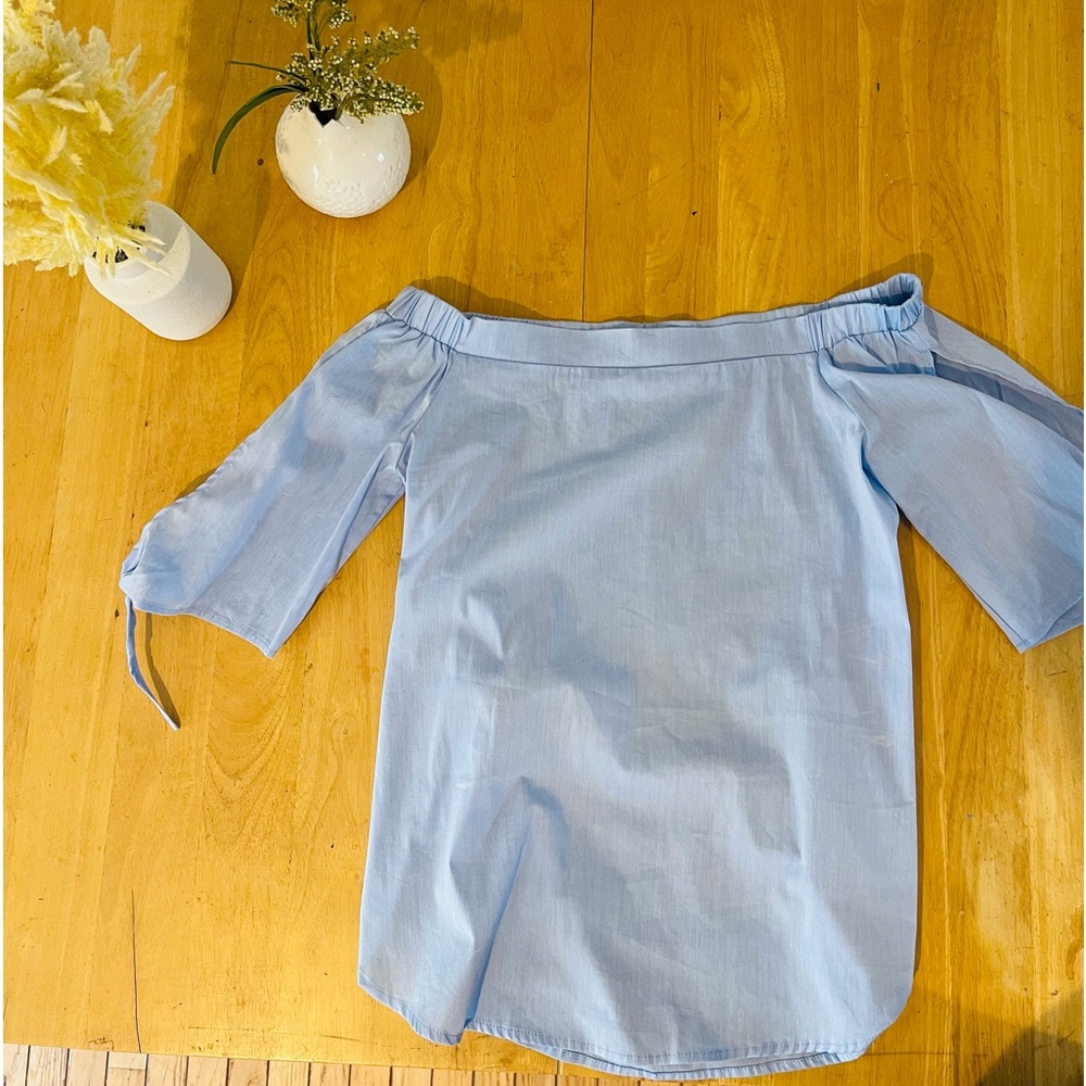 Sky Blue top -  open sleeves with ties.